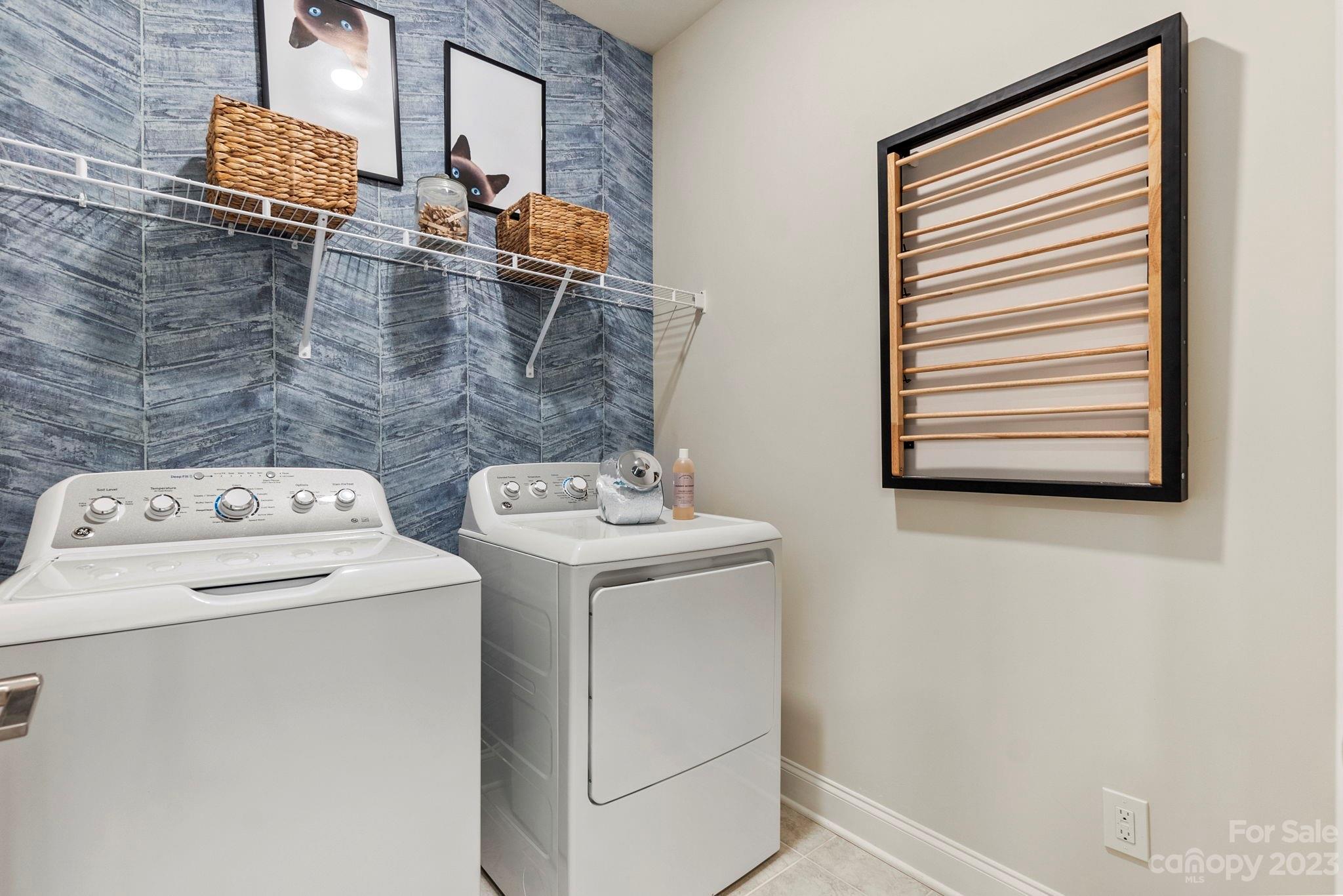8915 Winding Waters Road Harrisburg, NC 28215 - Photo 23 of 30 a utility room with dryer and washer