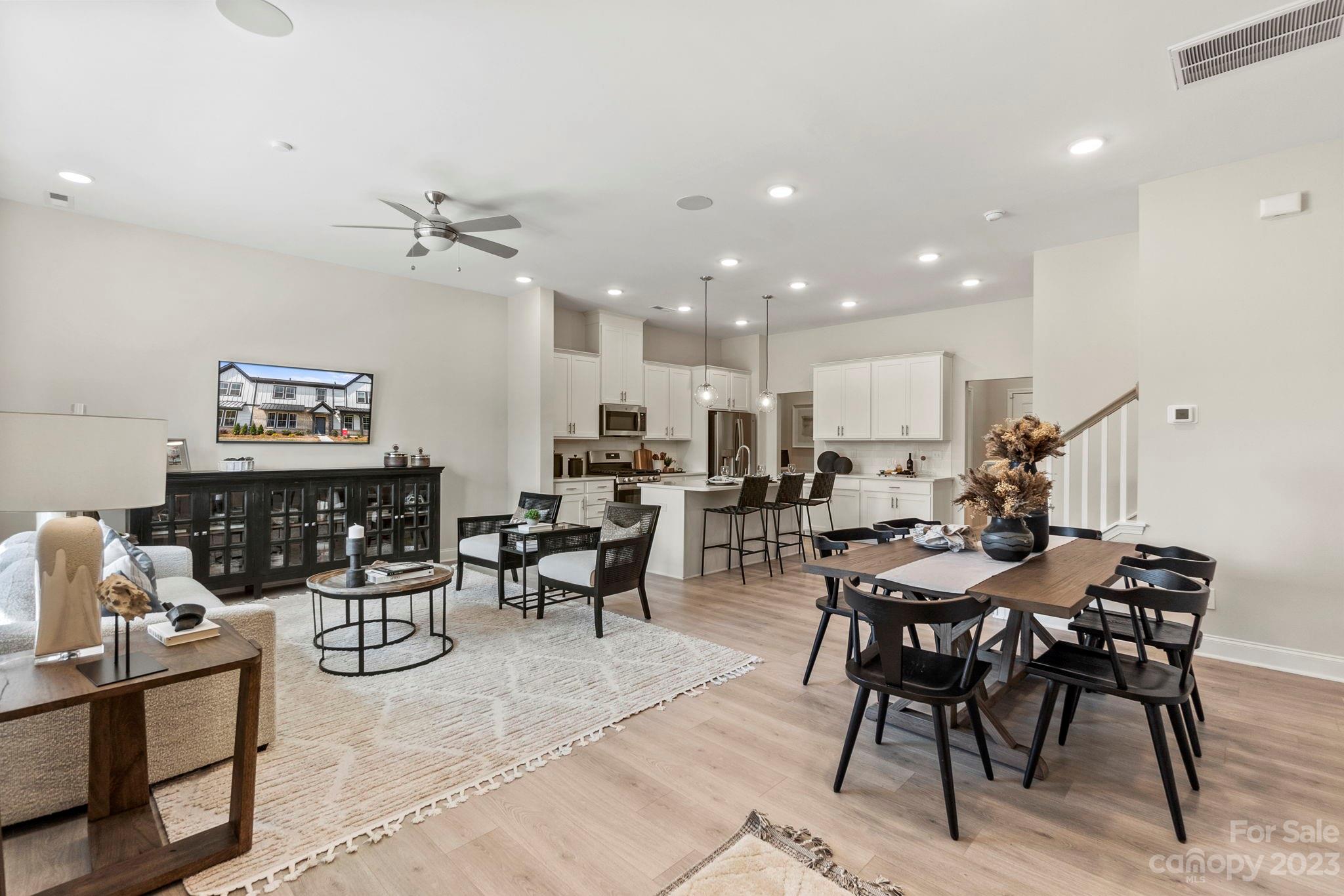 8915 Winding Waters Road Harrisburg, NC 28215 - Photo 8 of 30 a living room with lots of furniture and lots of furniture