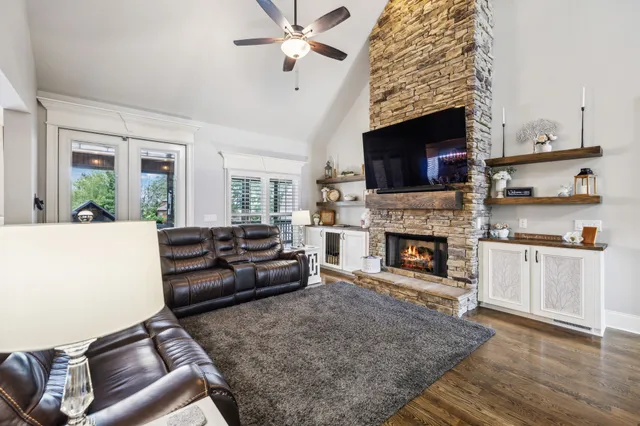 a kitchen with kitchen island granite countertop lots of counter top space and stainless steel appliances