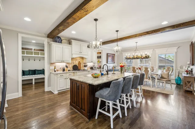 a bedroom with a bed and a television