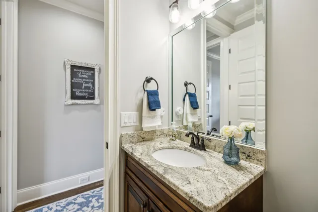 a building outdoor space with patio furniture and potted plants
