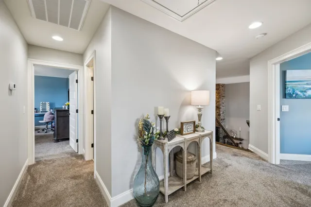 a view of a house with sitting area and a yard