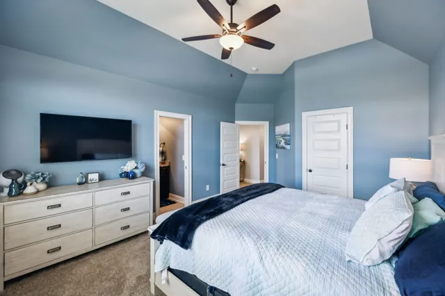 a view of a house with swimming pool and sitting area