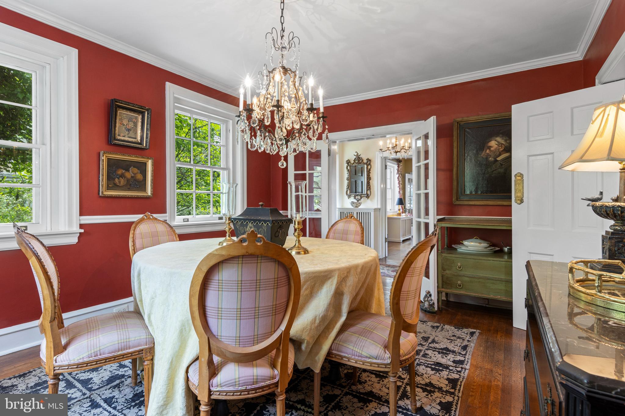60 Old Eagle School Road Wayne, PA 19087 - Photo 11 of 43 a view of a dining room with furniture a chandelier and wooden floor