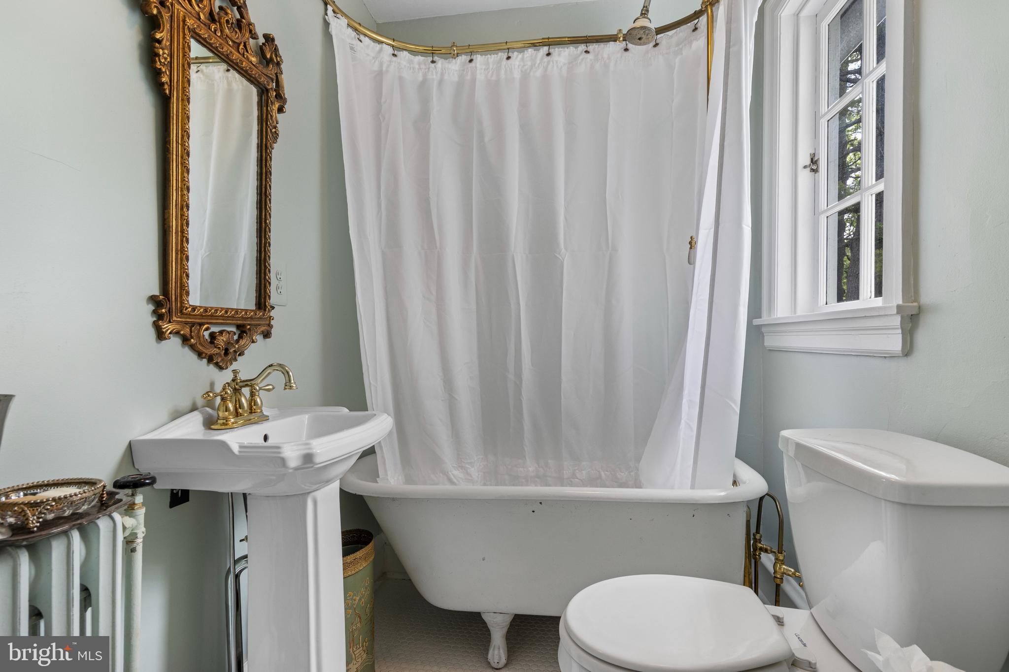 60 Old Eagle School Road Wayne, PA 19087 - Photo 26 of 43 a bathroom with a sink toilet and shower
