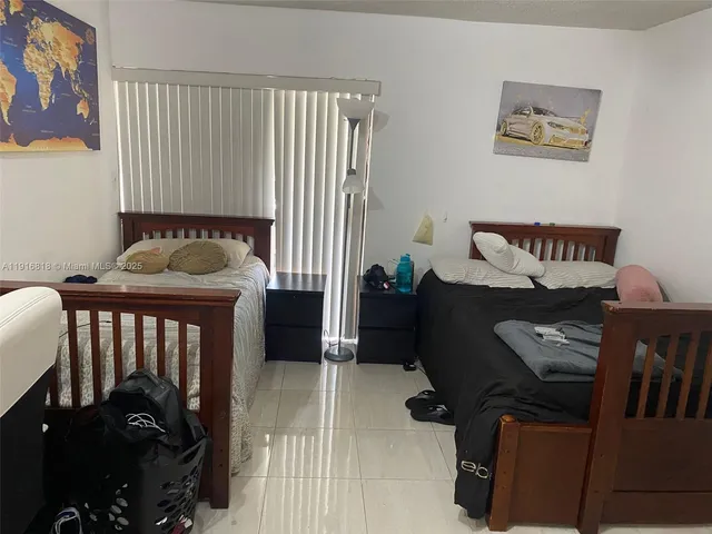 a bathroom with a shower and a bath tub