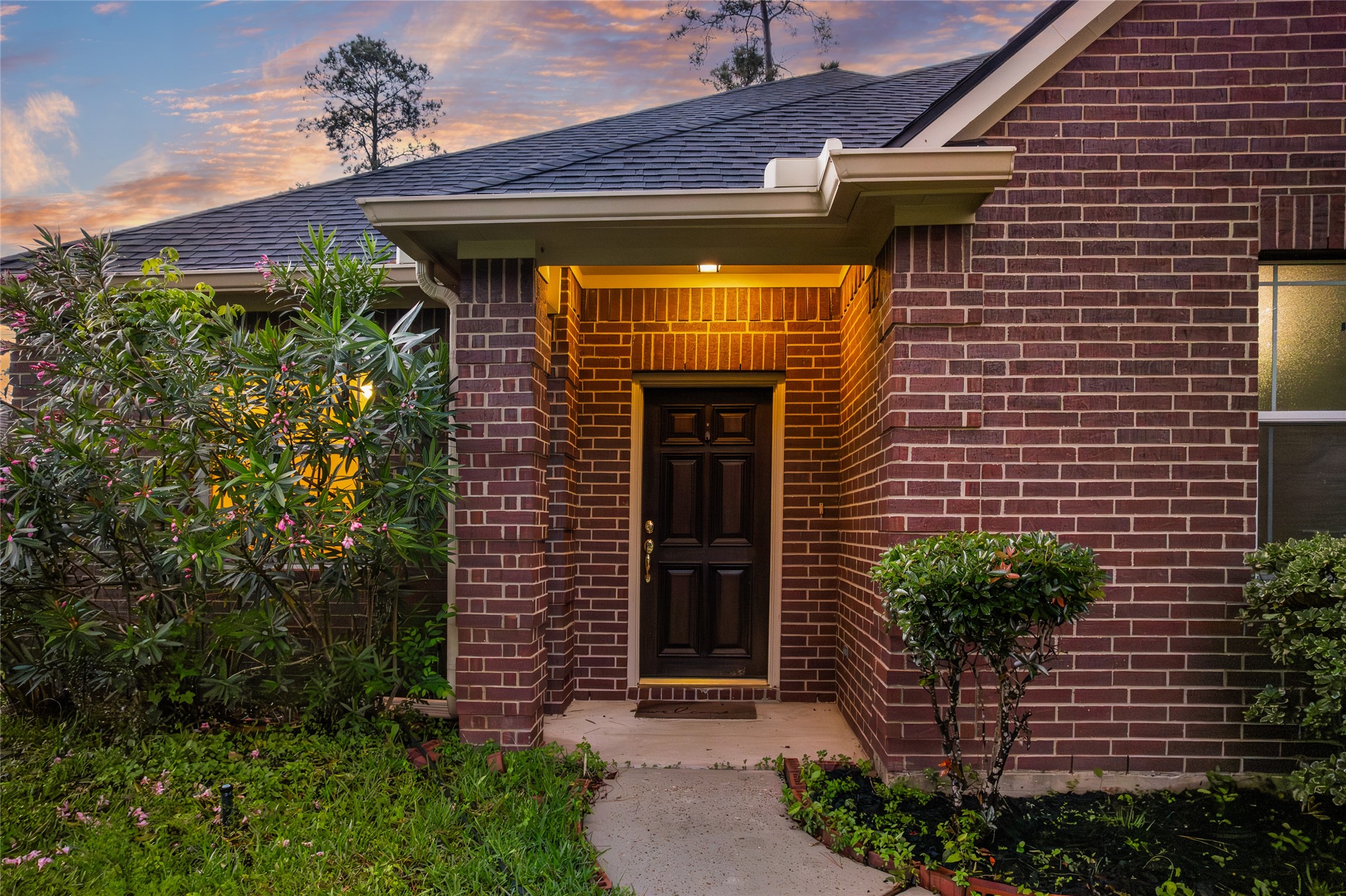 629 Spring Forest Drive Conroe, TX 77302 - Photo 3 of 39 Gorgeous wooden entry door welcomes you with classic charm and character!