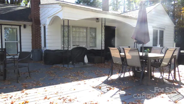 a view of balcony with couch and outdoor seating