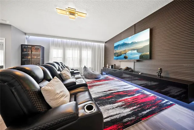 a bedroom with furniture and a baby crib