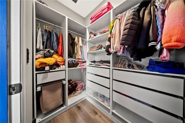 a bathroom with a tub and shower