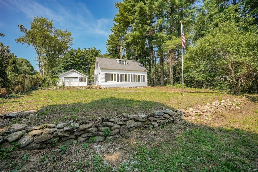61 West Street Ludlow, MA 01056 - Photo 20 of 29 a view of a house with a yard