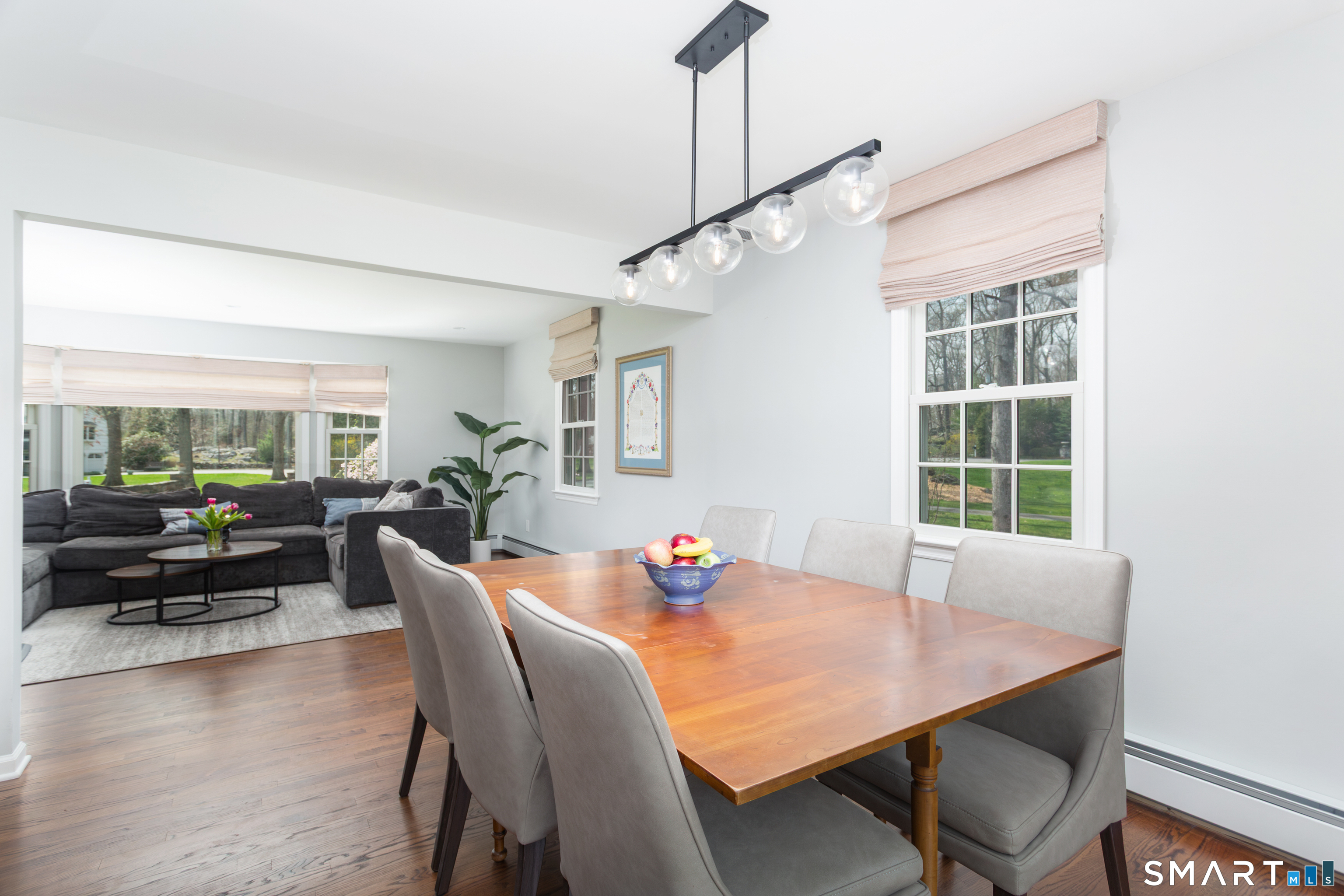 33 Cardinal Road Weston, CT 06883 - Photo 15 of 38 a view of a dining room with furniture window and outside view