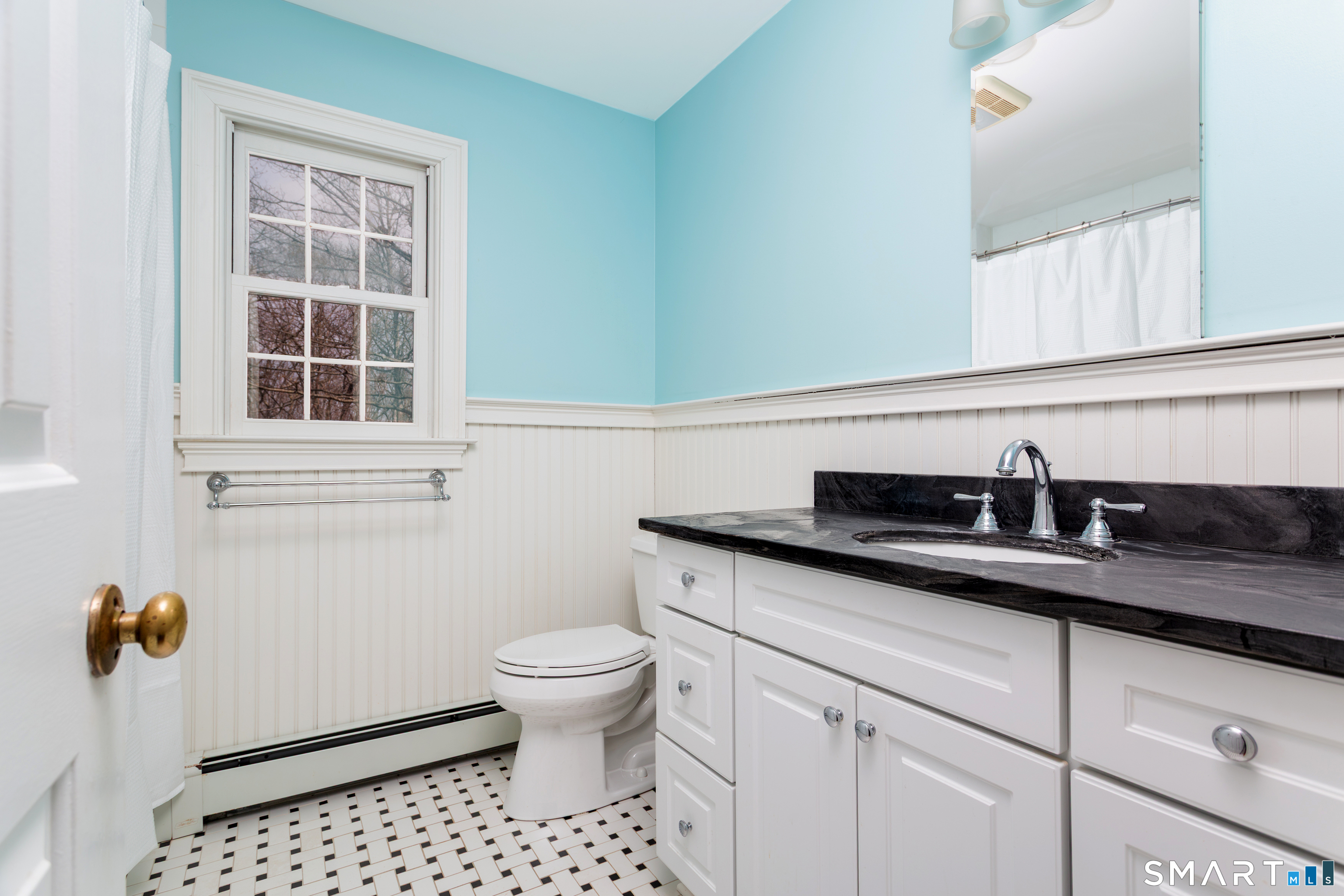 33 Cardinal Road Weston, CT 06883 - Photo 28 of 38 a bathroom with a sink and a toilet