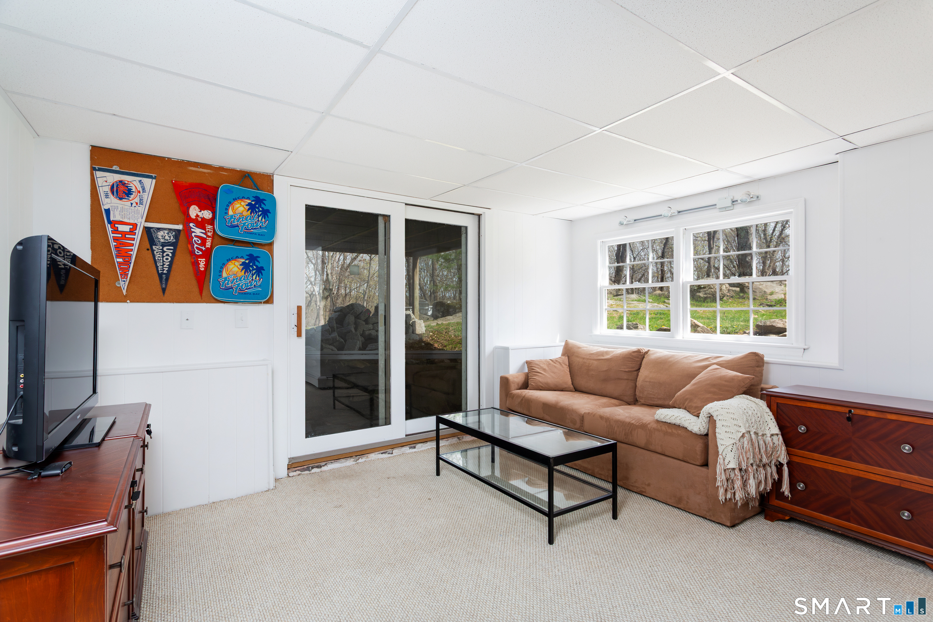 33 Cardinal Road Weston, CT 06883 - Photo 30 of 38 a living room with furniture and a window