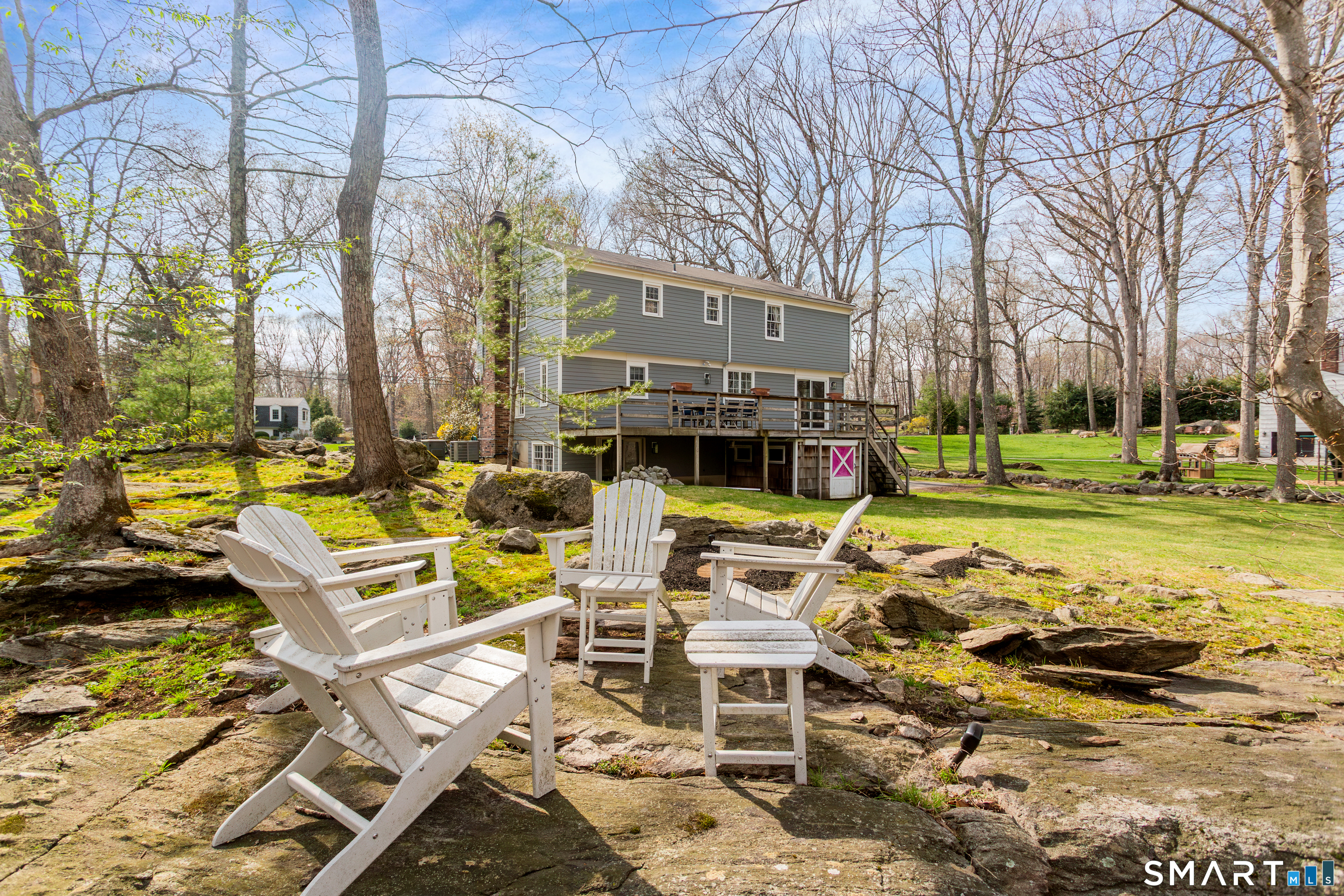 33 Cardinal Road Weston, CT 06883 - Photo 36 of 38 a view of a patio with swimming pool