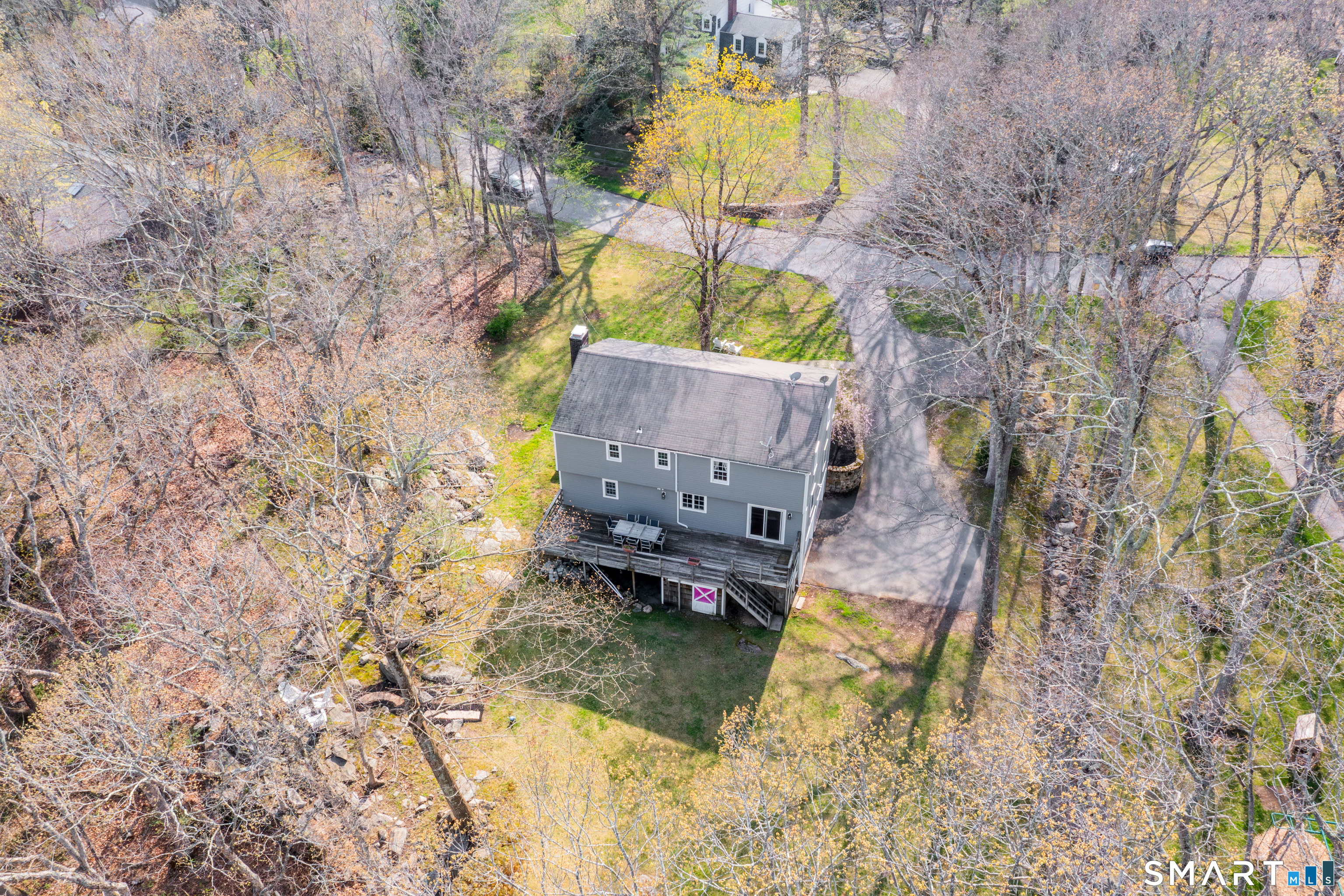33 Cardinal Road Weston, CT 06883 - Photo 38 of 38 a bird view of house with outdoor space