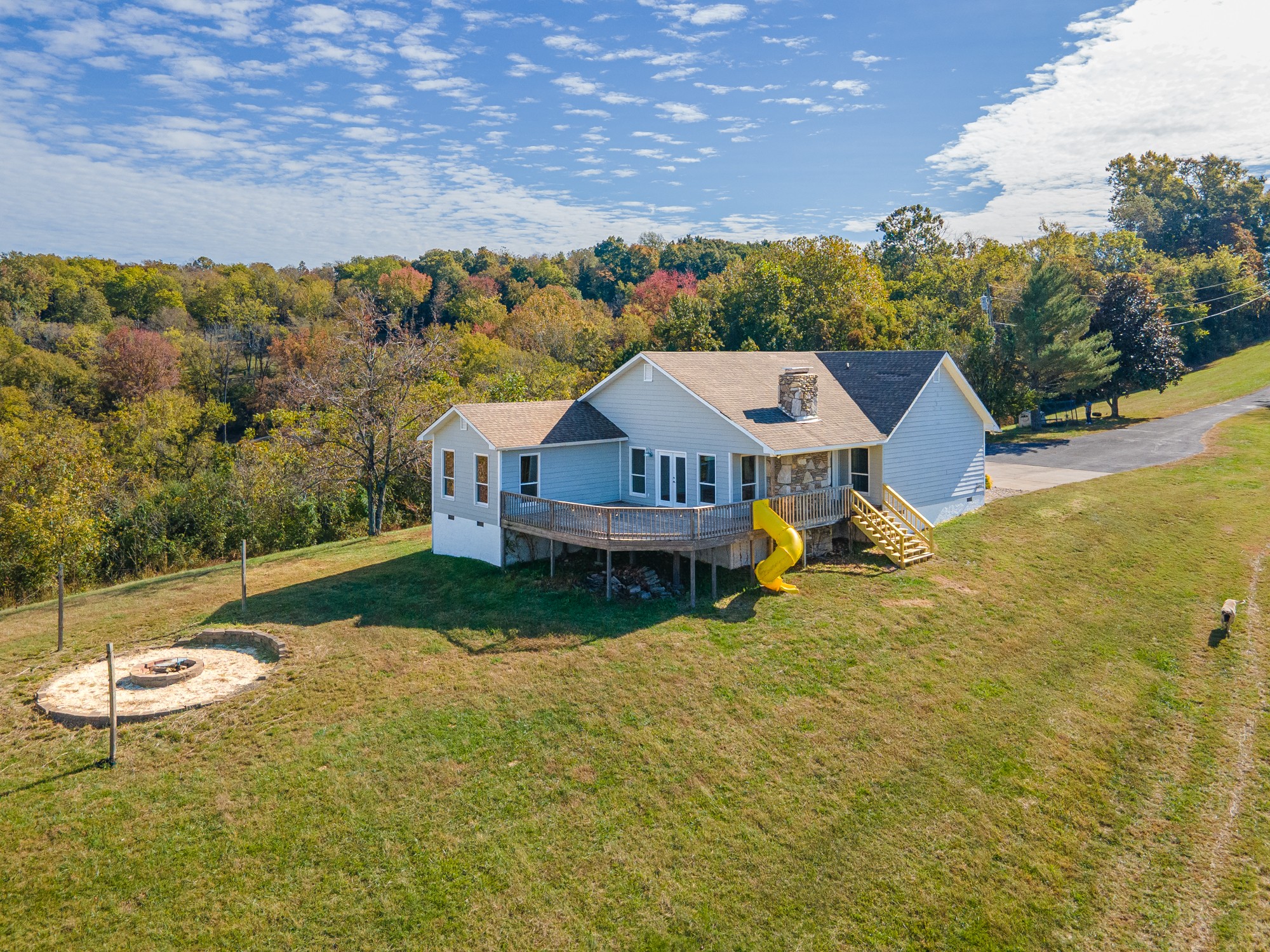 2191 Garner Road Mount Pleasant, TN 38474 - Photo 1 of 50 a view of a house with yard and roof