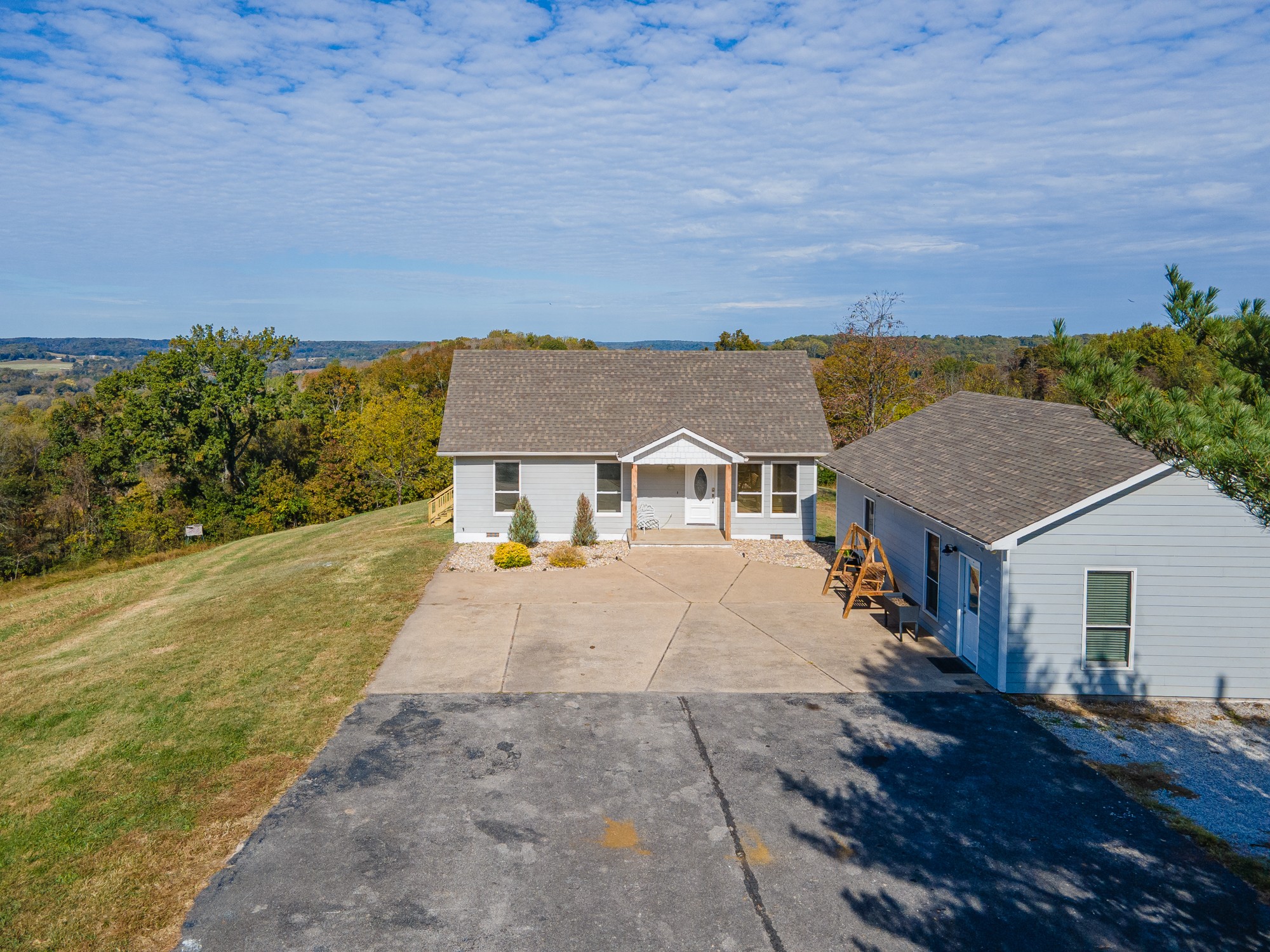 2191 Garner Road Mount Pleasant, TN 38474 - Photo 23 of 50 a aerial view of a house with a yard