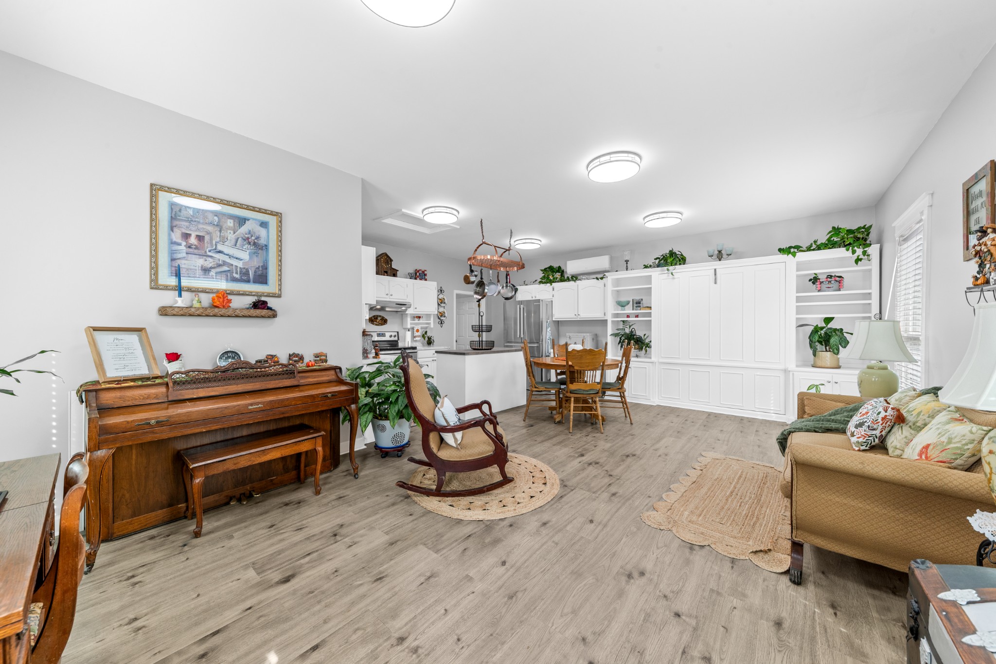 2191 Garner Road Mount Pleasant, TN 38474 - Photo 24 of 50 a living room with furniture a dining table and a piano table