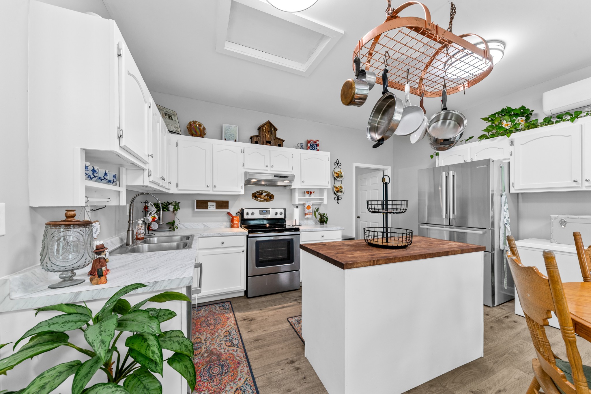 2191 Garner Road Mount Pleasant, TN 38474 - Photo 26 of 50 a kitchen that has a lot of cabinets in it
