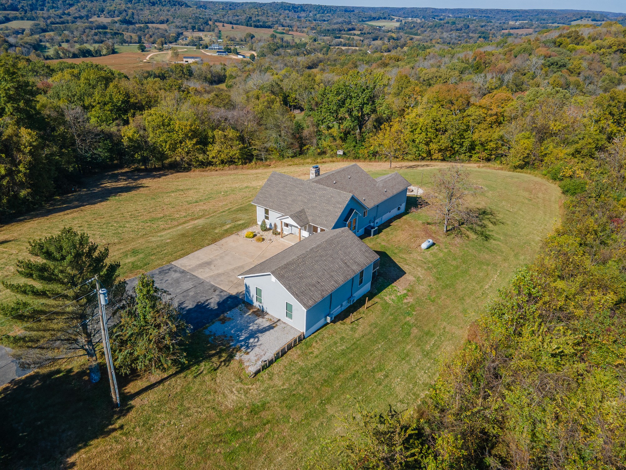 2191 Garner Road Mount Pleasant, TN 38474 - Photo 3 of 50 an aerial view of a house with a yard