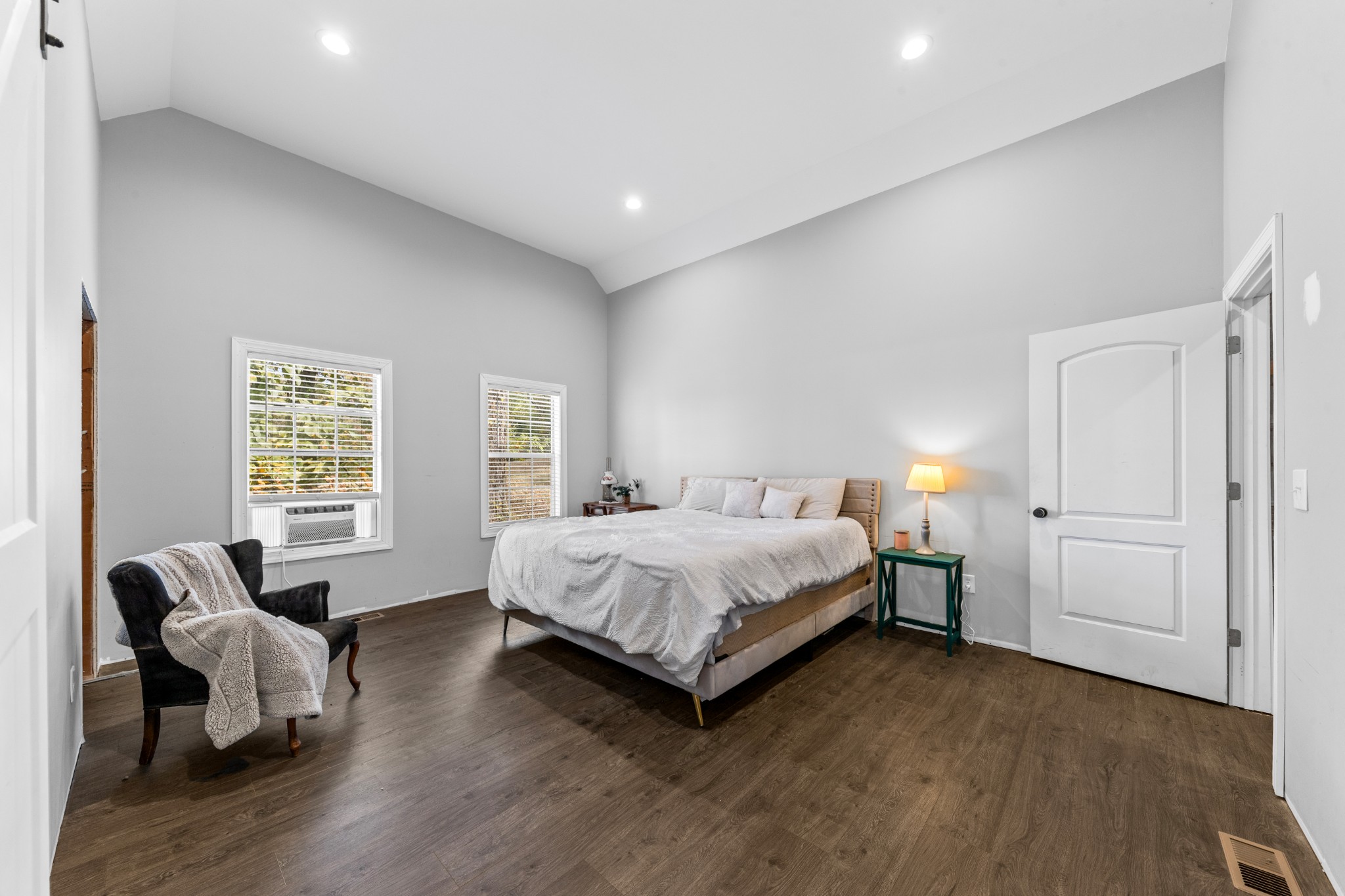 2191 Garner Road Mount Pleasant, TN 38474 - Photo 42 of 50 a spacious bedroom with a bed and a couch