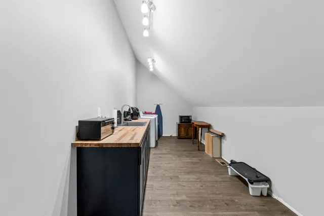 a view of a chairs and table in the patio