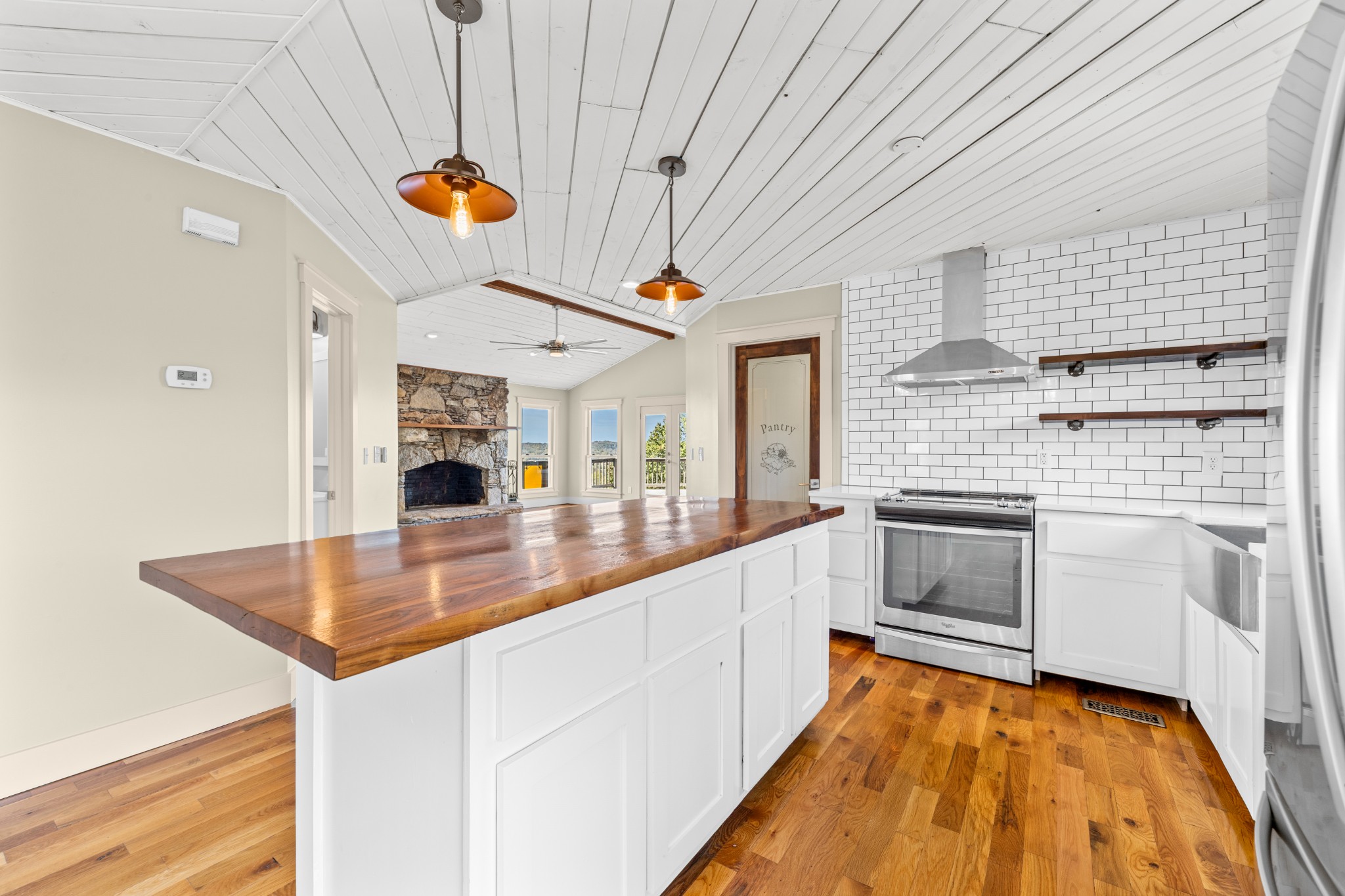 2191 Garner Road Mount Pleasant, TN 38474 - Photo 6 of 50 a kitchen with stainless steel appliances granite countertop a sink a stove oven a counter top space and cabinets