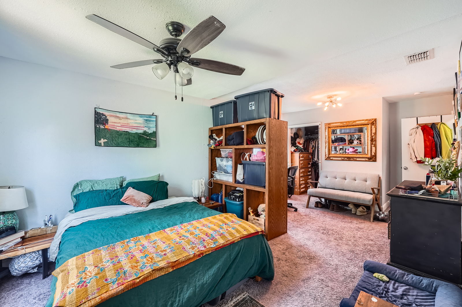 5605 Tura Lane Austin, TX 78721 - Photo 4 of 11 Bedroom featuring carpet flooring and ceiling fan