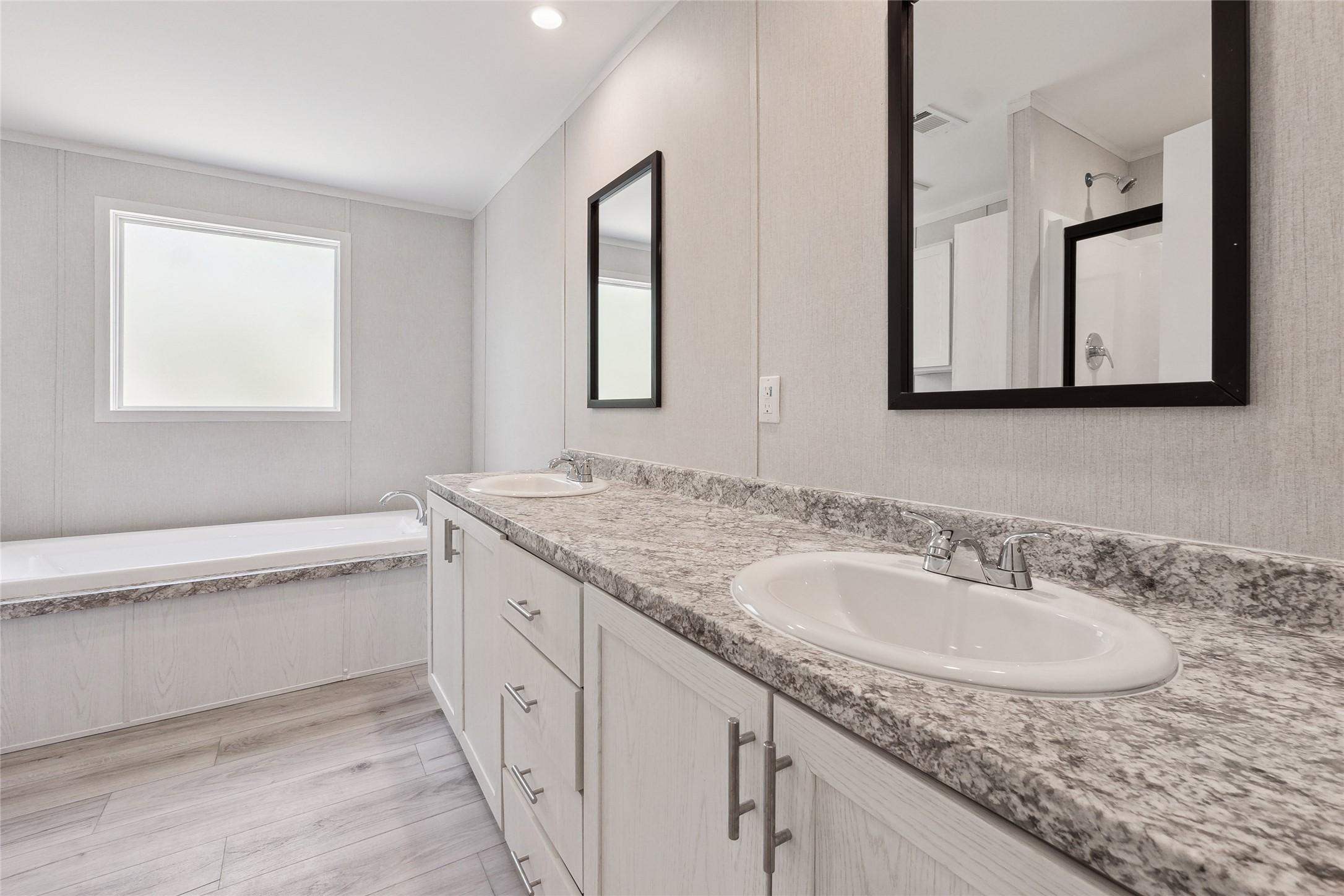 855 Roosevelt Road Kingsbury, TX 78638 - Photo 23 of 33 a bathroom with a granite countertop sink and a mirror