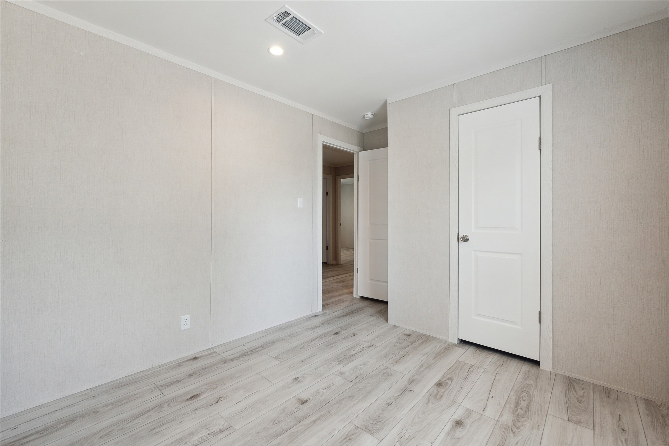 855 Roosevelt Road Kingsbury, TX 78638 - Photo 27 of 33 a view of an empty room with wooden floor