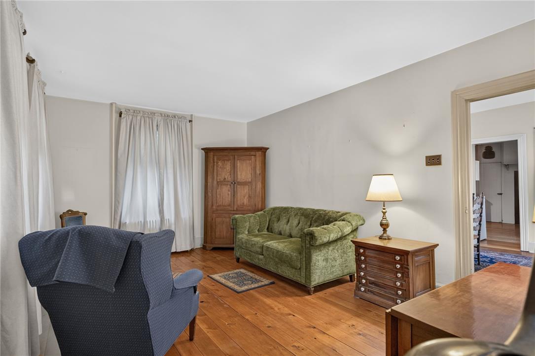 765 East Macada Road Bethlehem, PA 18017 - Photo 10 of 46 Natural wood flooring complements this inviting living room.