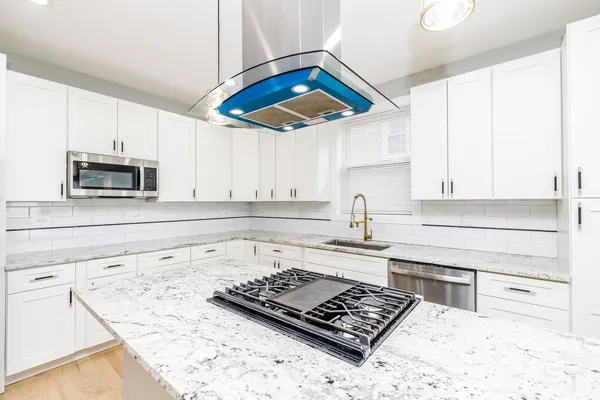 a view of a livingroom with gym equipment