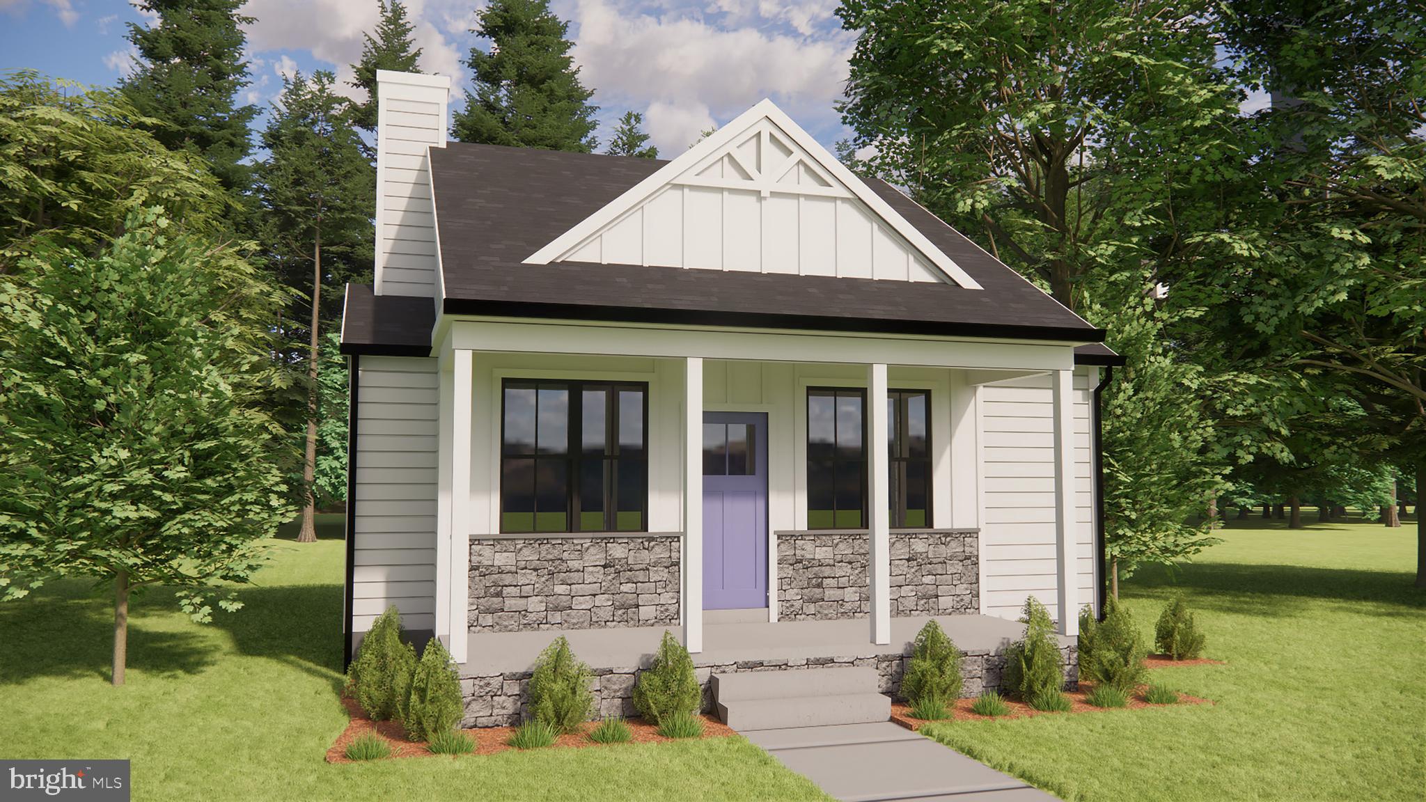 front view of a house with a yard