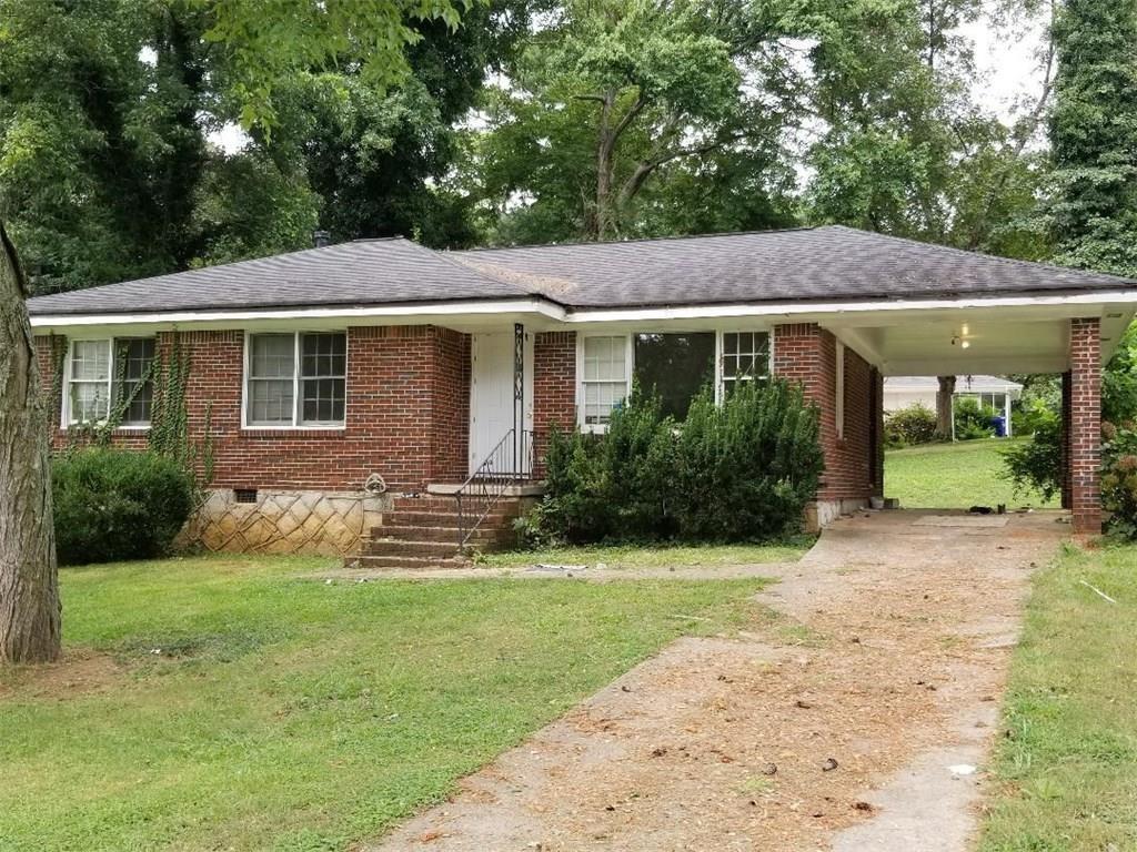 2911 Gresham Rd S East Atlanta, GA 30316 - Photo 1 of 1 a front view of house with yard and green space
