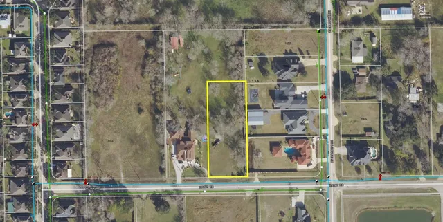 a bathroom with a mirror and a sink