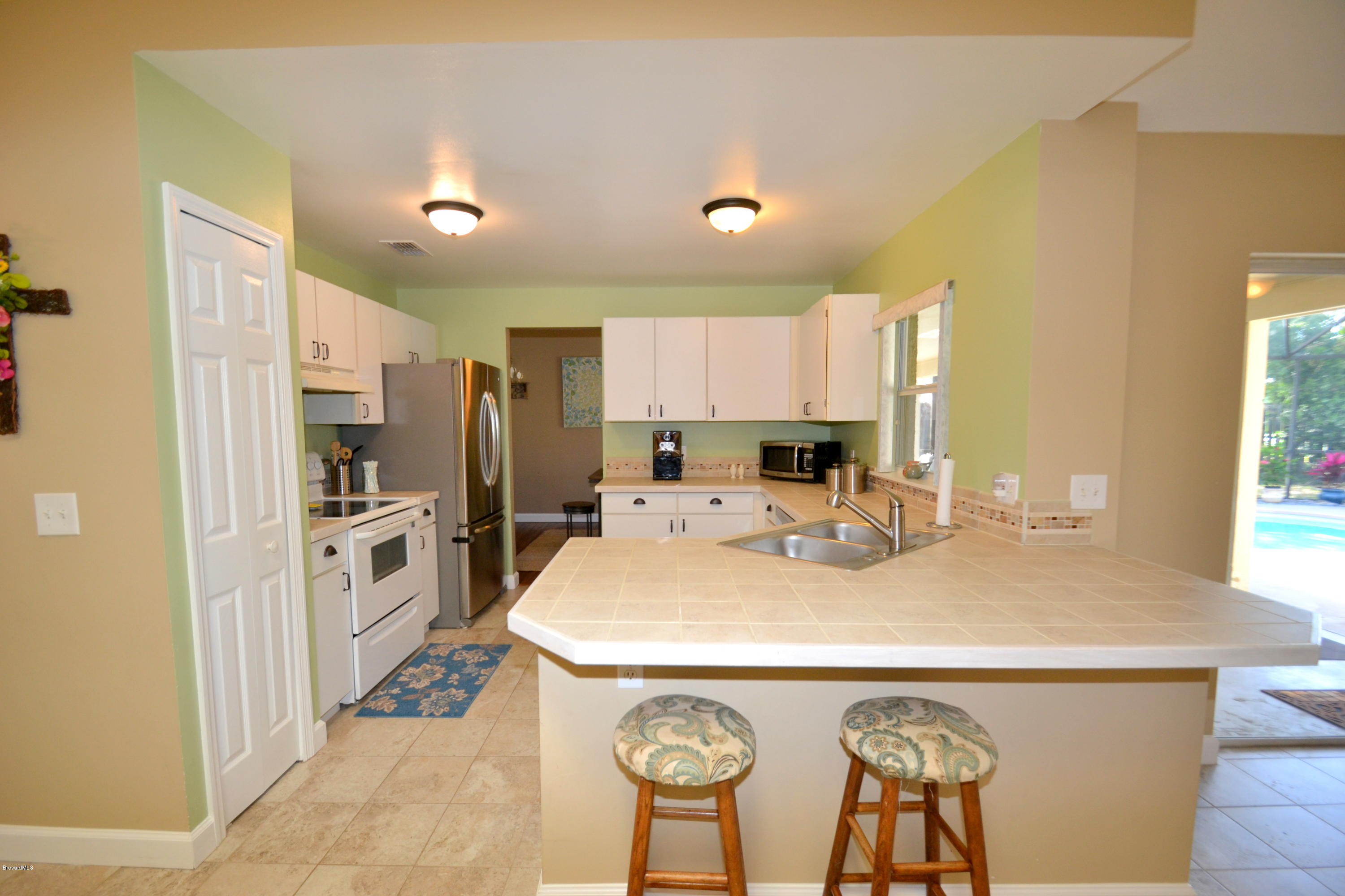 2320 High Ridge Road Palm Shores, FL 32935 - Photo 11 of 30 Large Bright Kitchen