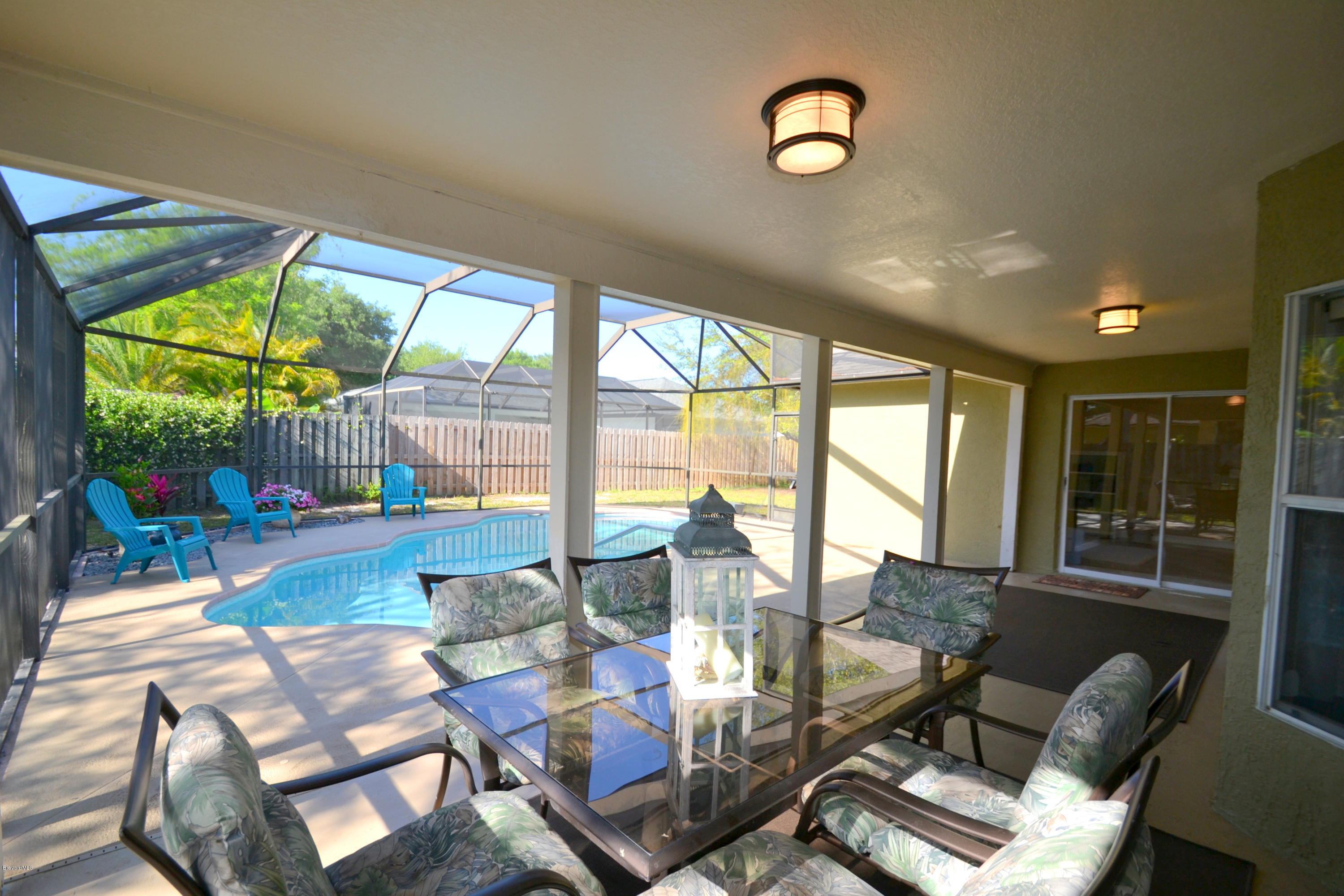 2320 High Ridge Road Palm Shores, FL 32935 - Photo 4 of 30 Patio Dining overlooking pool
