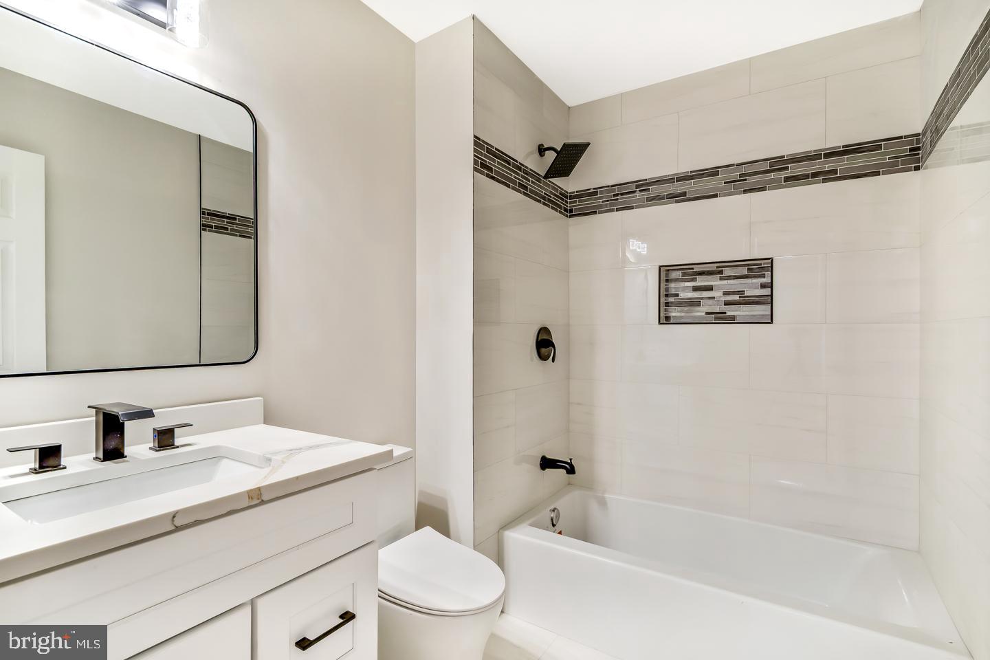 2704 Tall Pines Pine Hill, NJ 08021 - Photo 14 of 21 a bathroom with a granite countertop sink mirror vanity and toilet