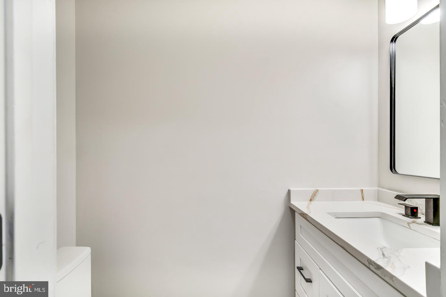 2704 Tall Pines Pine Hill, NJ 08021 - Photo 9 of 21 a bathroom with a sink and a mirror