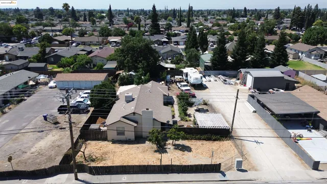 an aerial view of a house with a garden