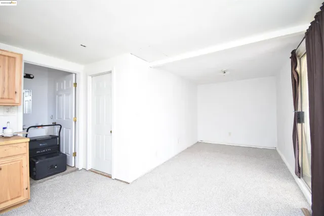 a view of a kitchen with a sink