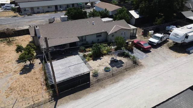 an aerial view of a house with garden