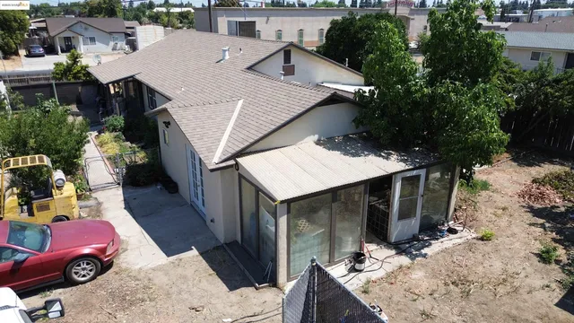 aerial view of a house with wooden deck