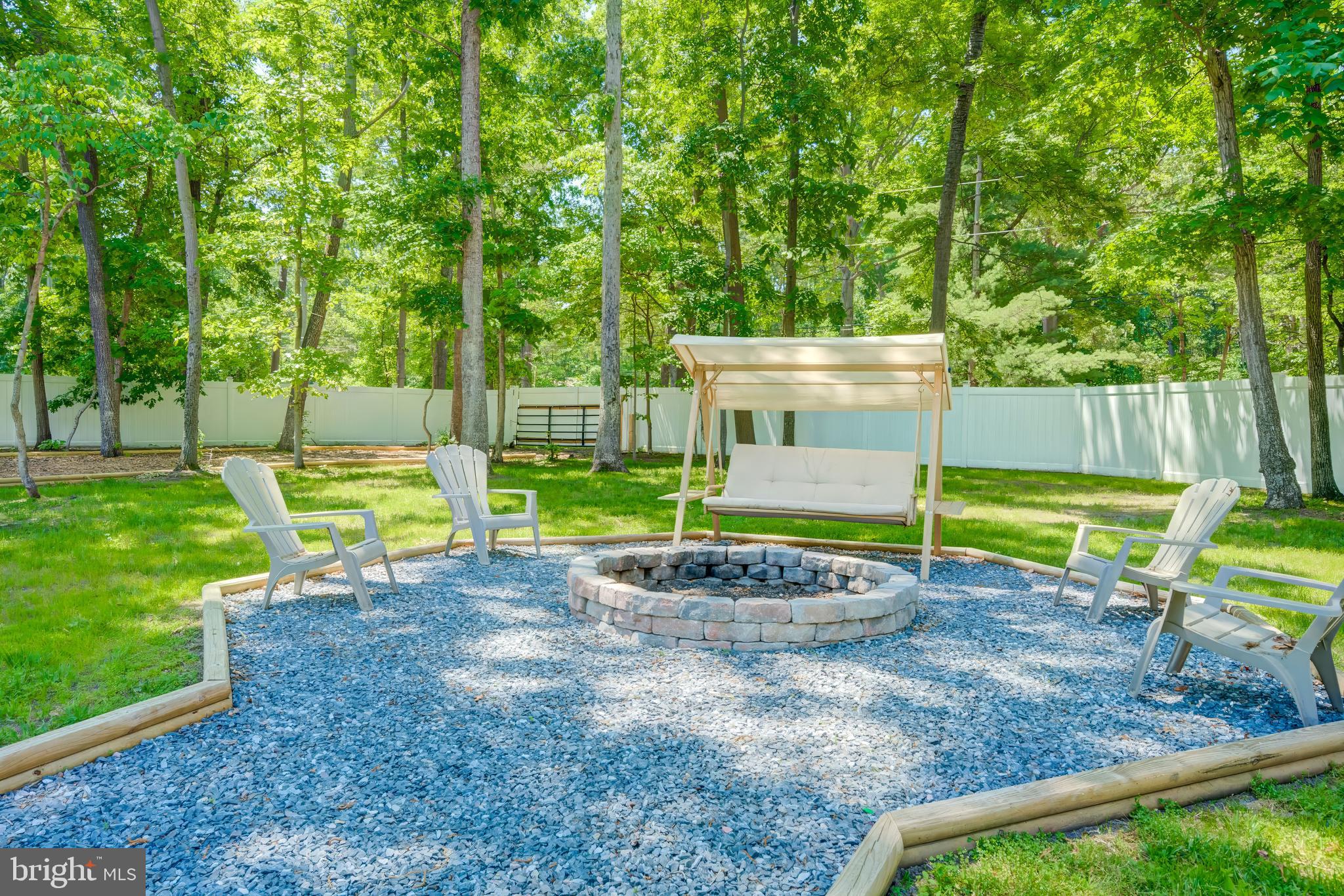 8331 Woodland Road Pasadena, MD 21122 - Photo 49 of 63 Relax by the Fire Pit