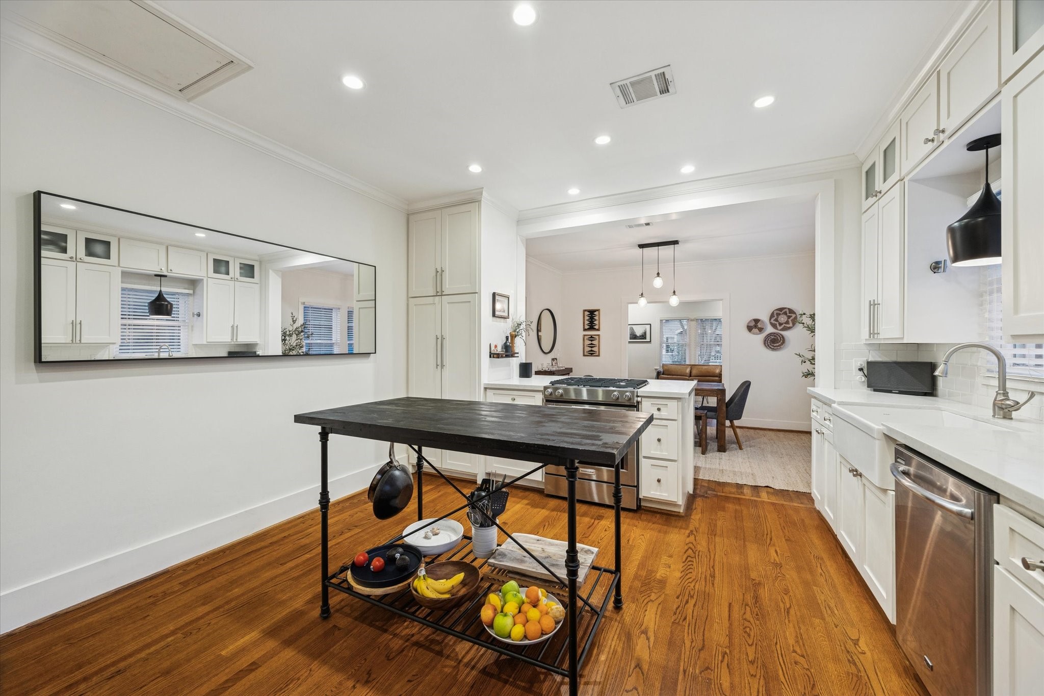 1135 Walling Street Houston, TX 77009 - Photo 12 of 32 table island & large rectangle accent mirror can be included with home.