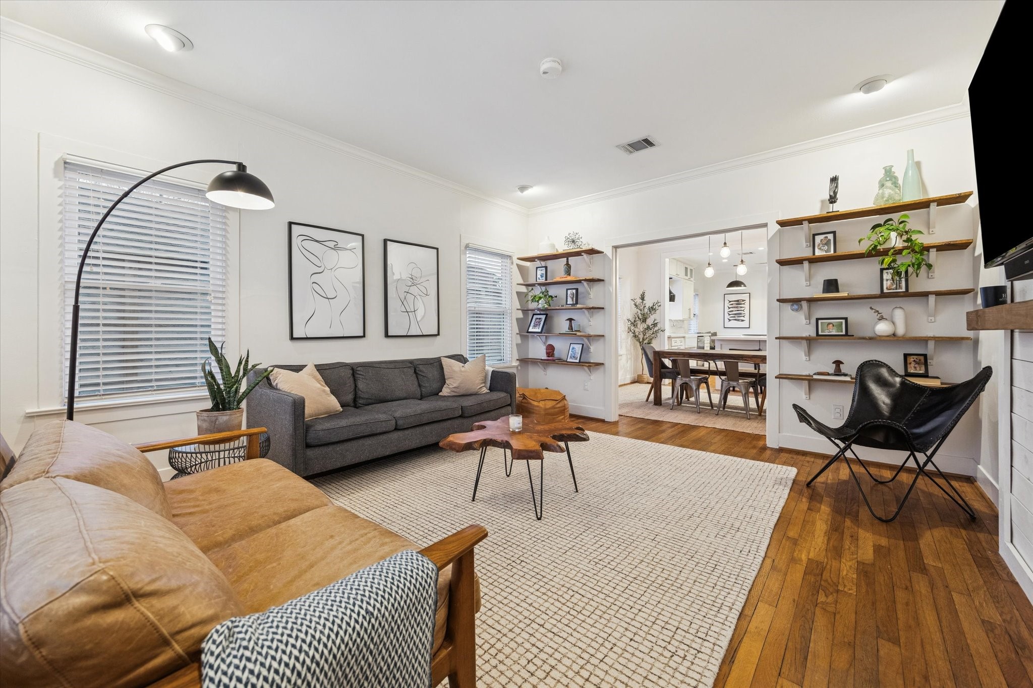 1135 Walling Street Houston, TX 77009 - Photo 4 of 32 formal living at entry, original oak wood floors, high ceilings, LED lighting, perfect dimensions.