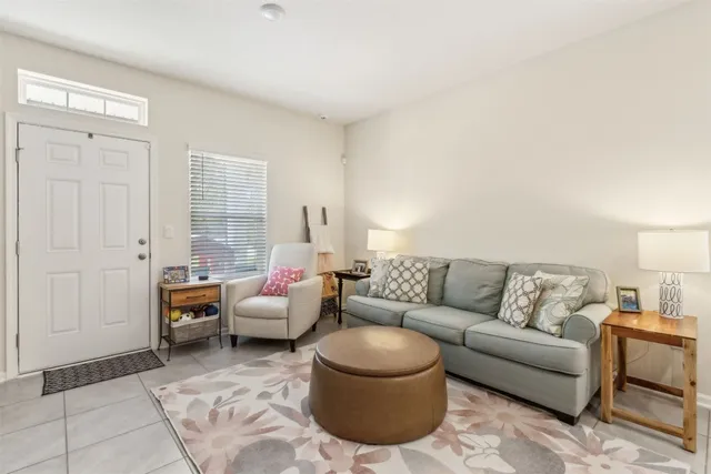 a living room with furniture and a couch