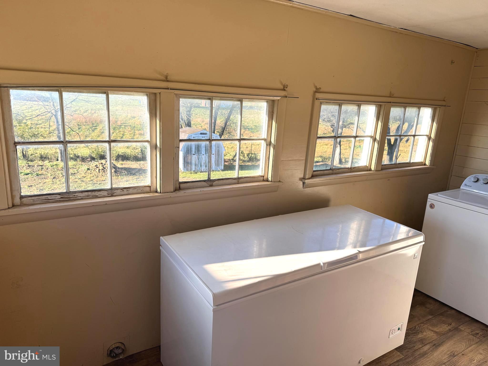 136 Shady Creek Road Clear Brook, VA 22624 - Photo 14 of 22 a room with window and wooden floor