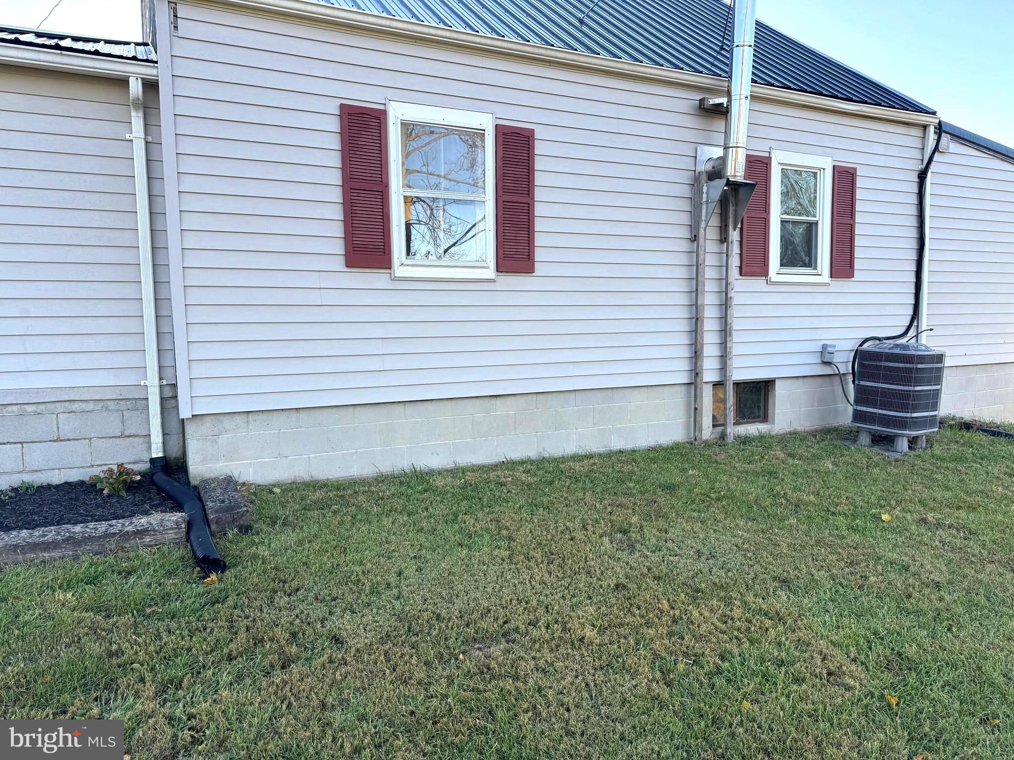 136 Shady Creek Road Clear Brook, VA 22624 - Photo 21 of 22 a view of a house with a backyard
